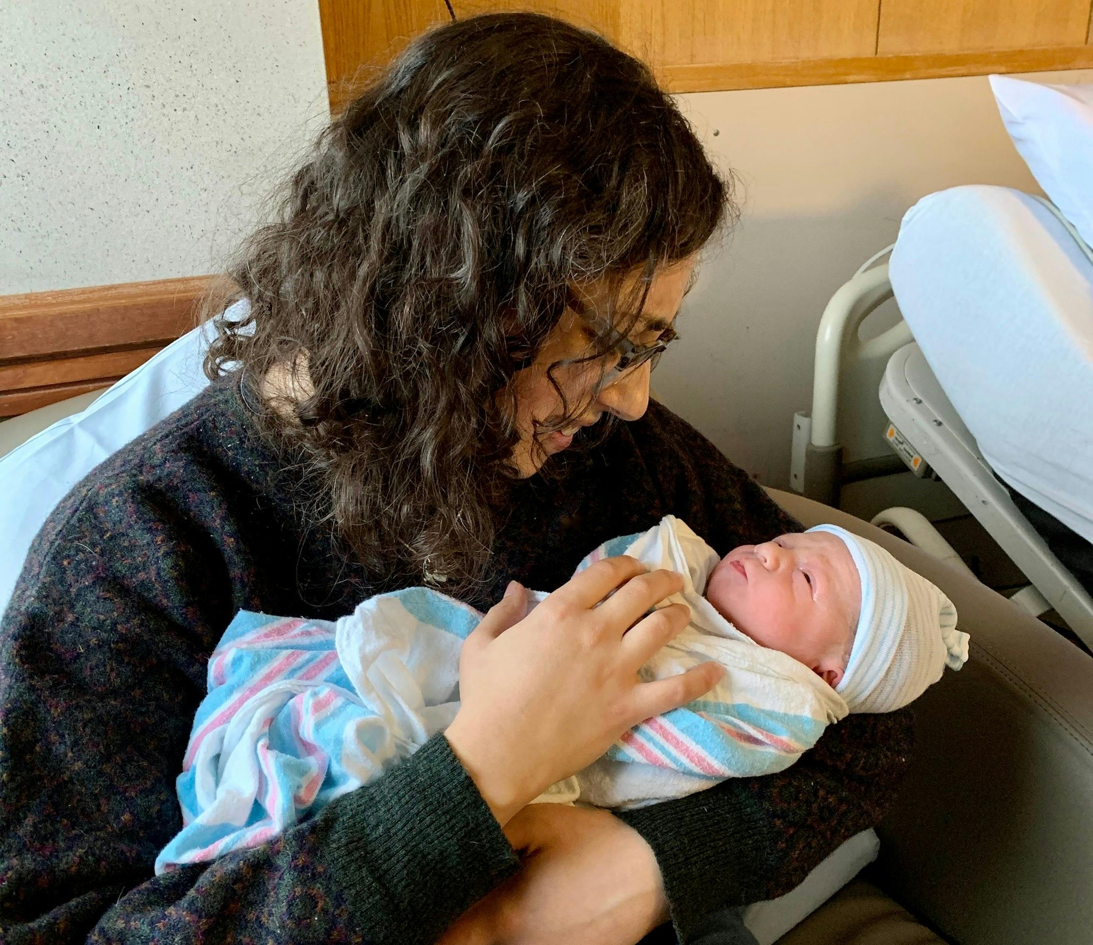 Katrina holding a her newborn nephew.