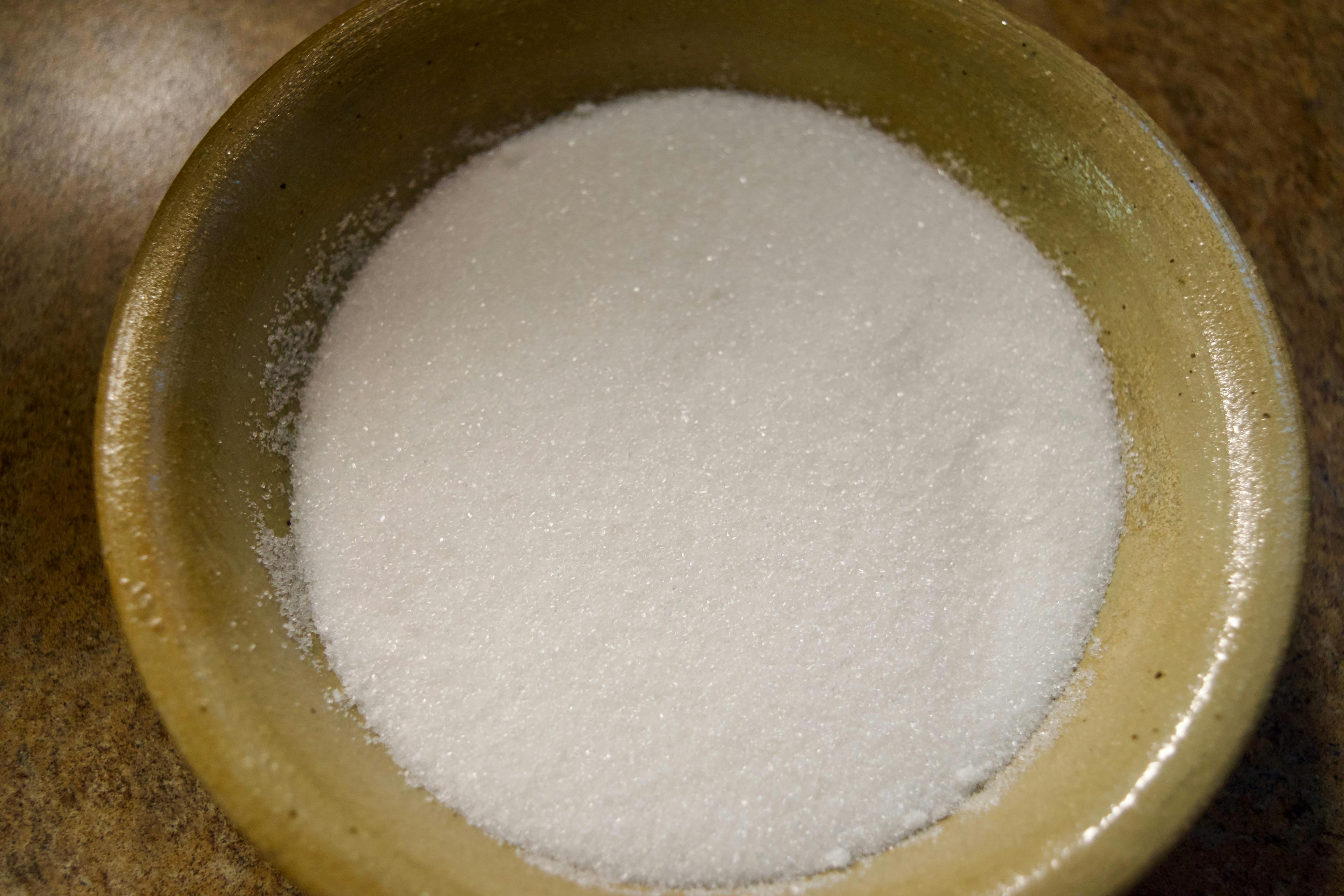 A small bowl of finely ground sugar