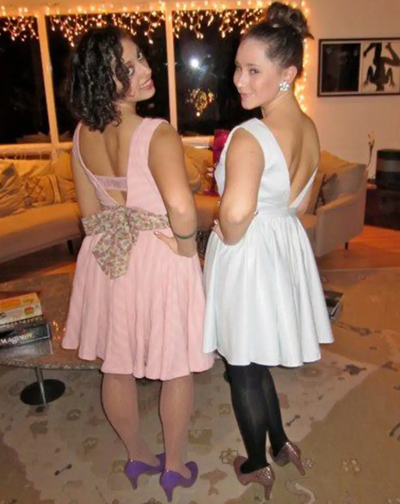 Showing the back of our dresses.