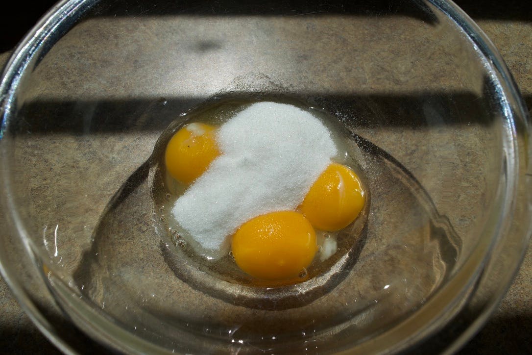 A bowl of yolks and sugar