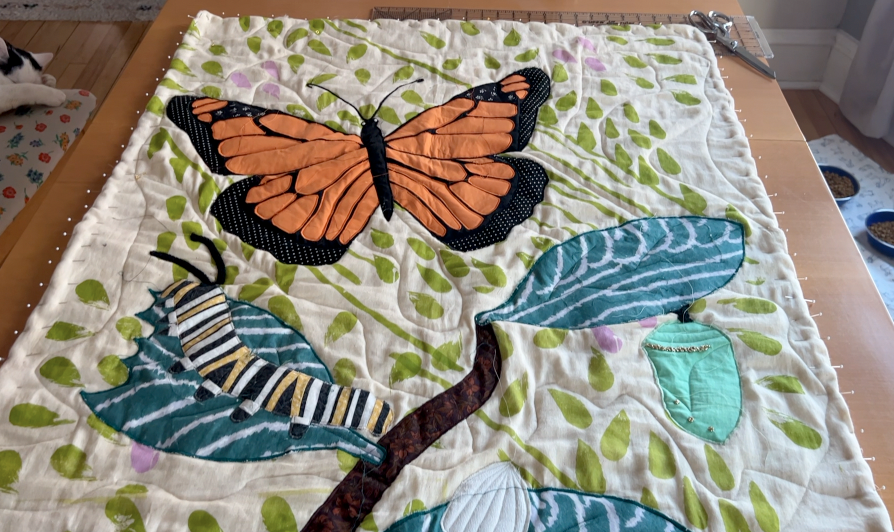 The whole quilt pinned around the edges