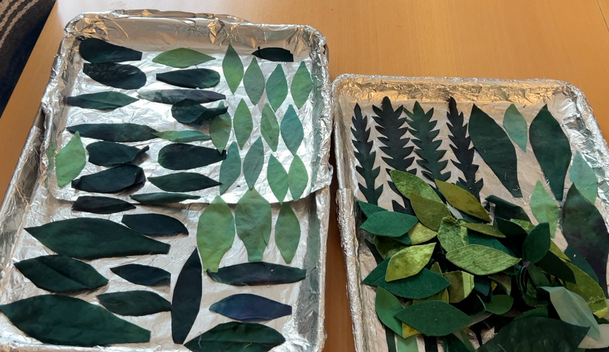 Trays of fabric leaves