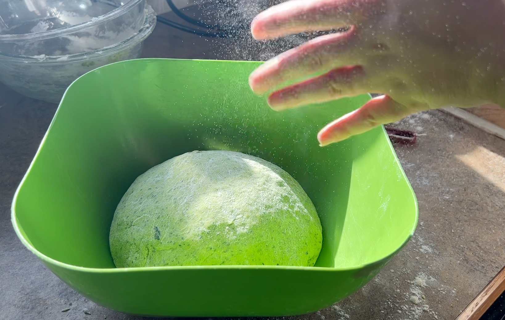Green dough in a bowl, that also happens to be green