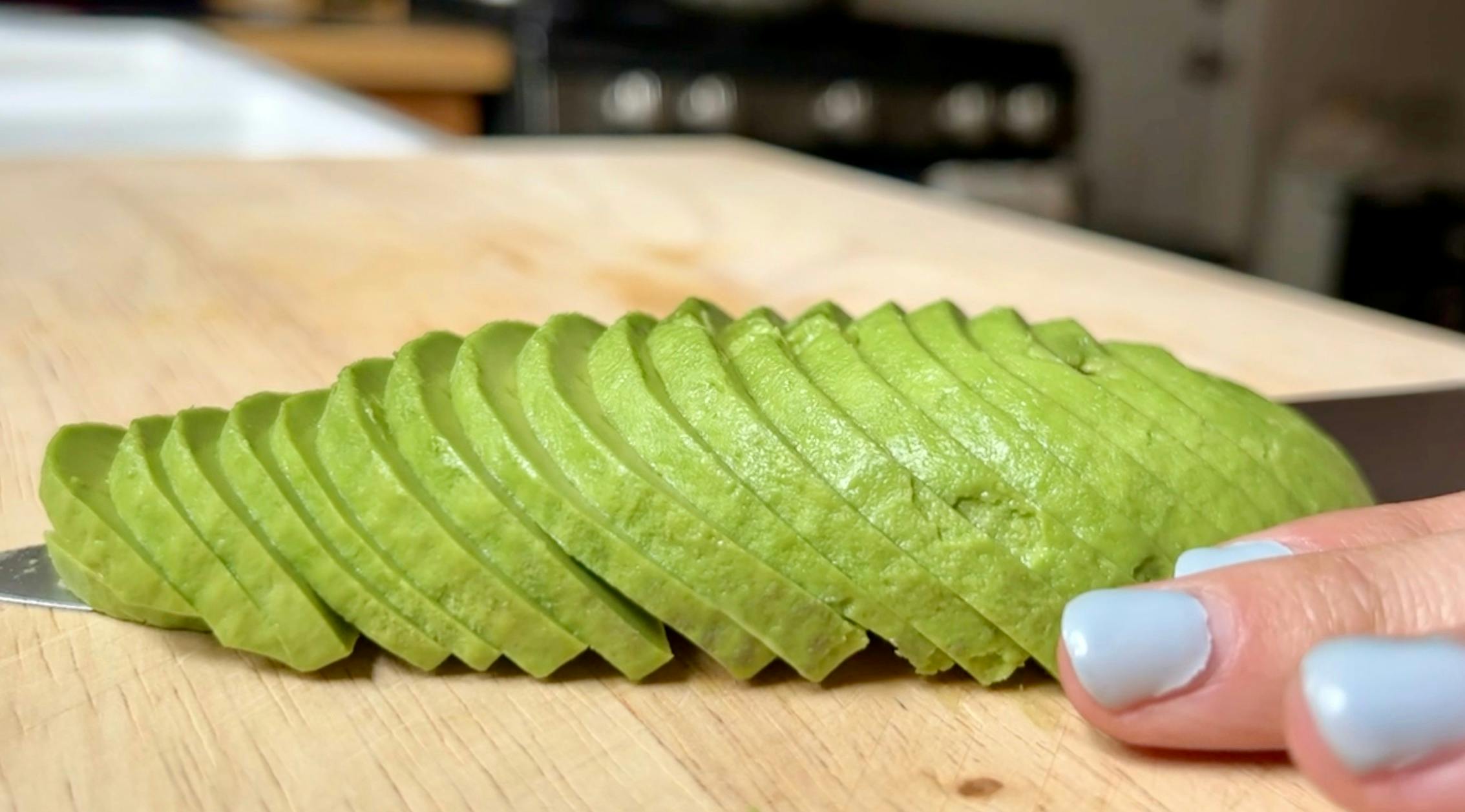 A thinly sliced avocado