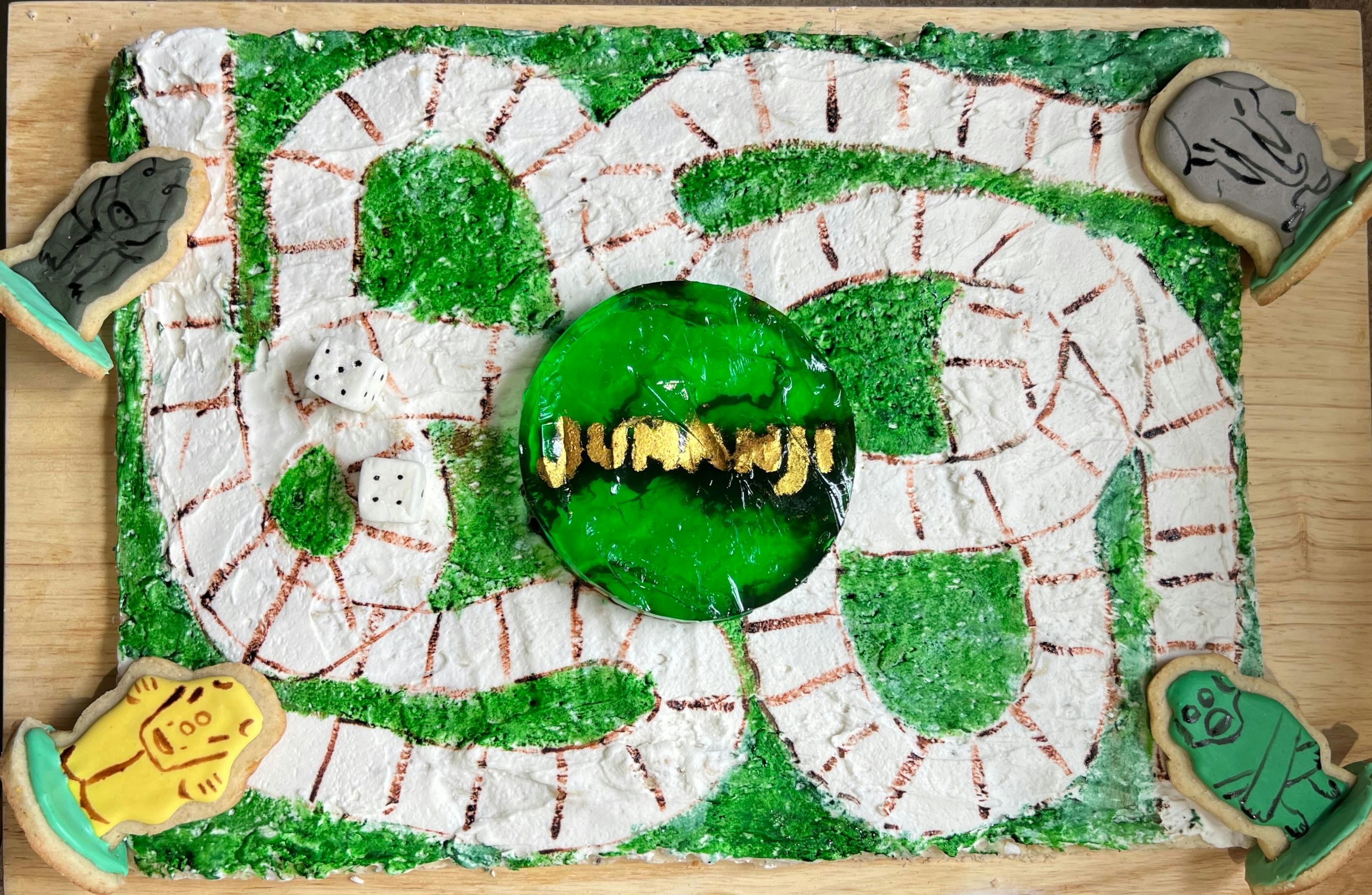 A bird's eye picture of a Jumanji board game, complete with pieces and dice, made of cookies