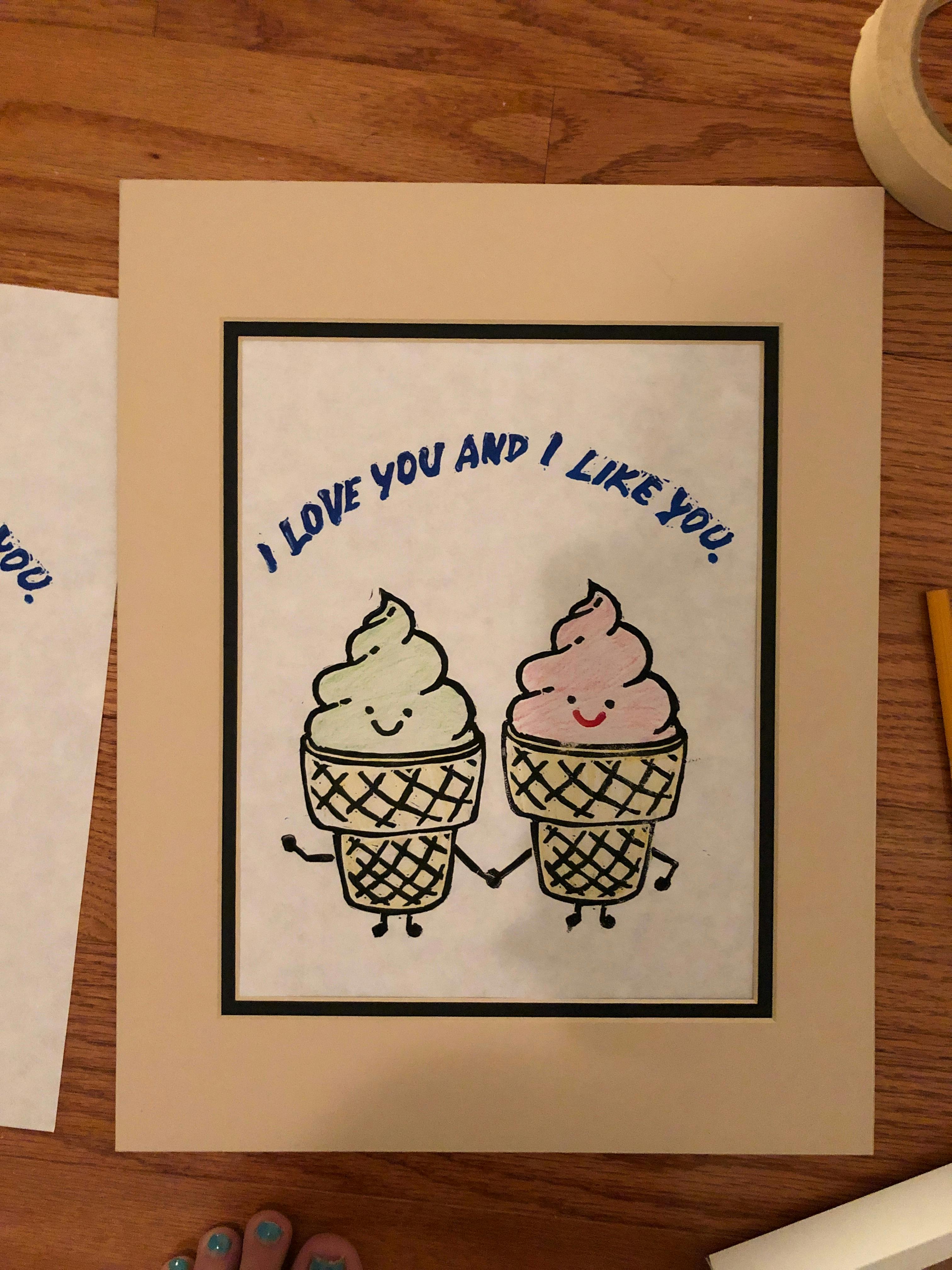 A print of two anthropomorphized ice cream cones holding hands.