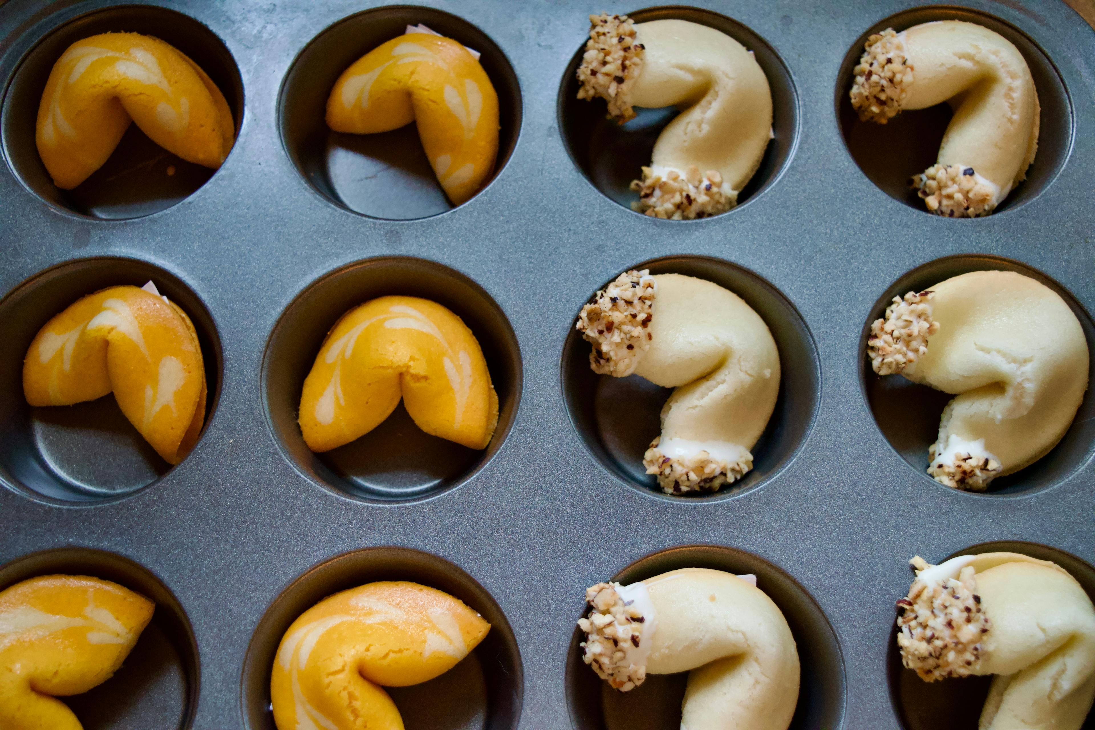 A muffin tin full of fortune cookies