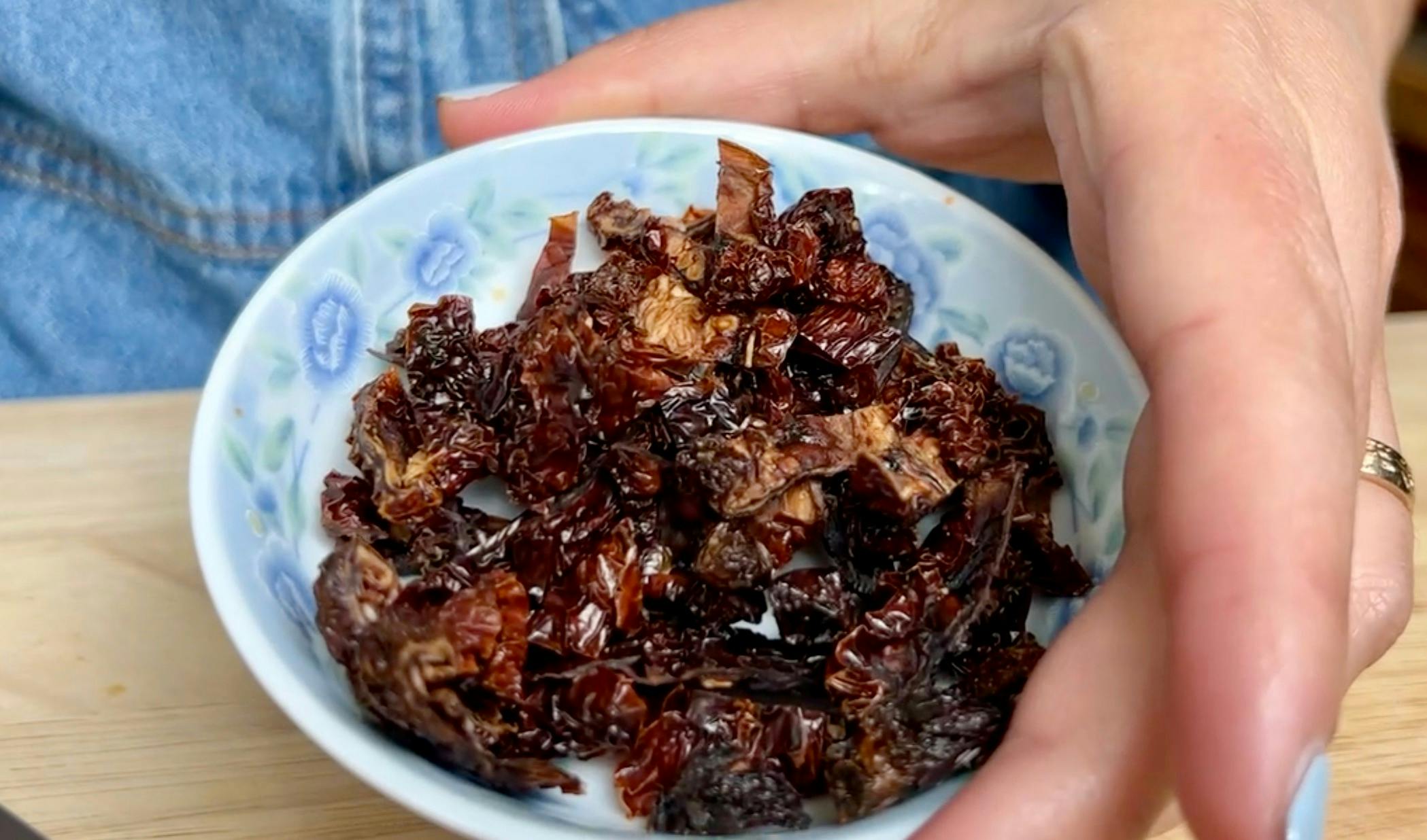 A dish of thinly sliced sun dried tomatoes