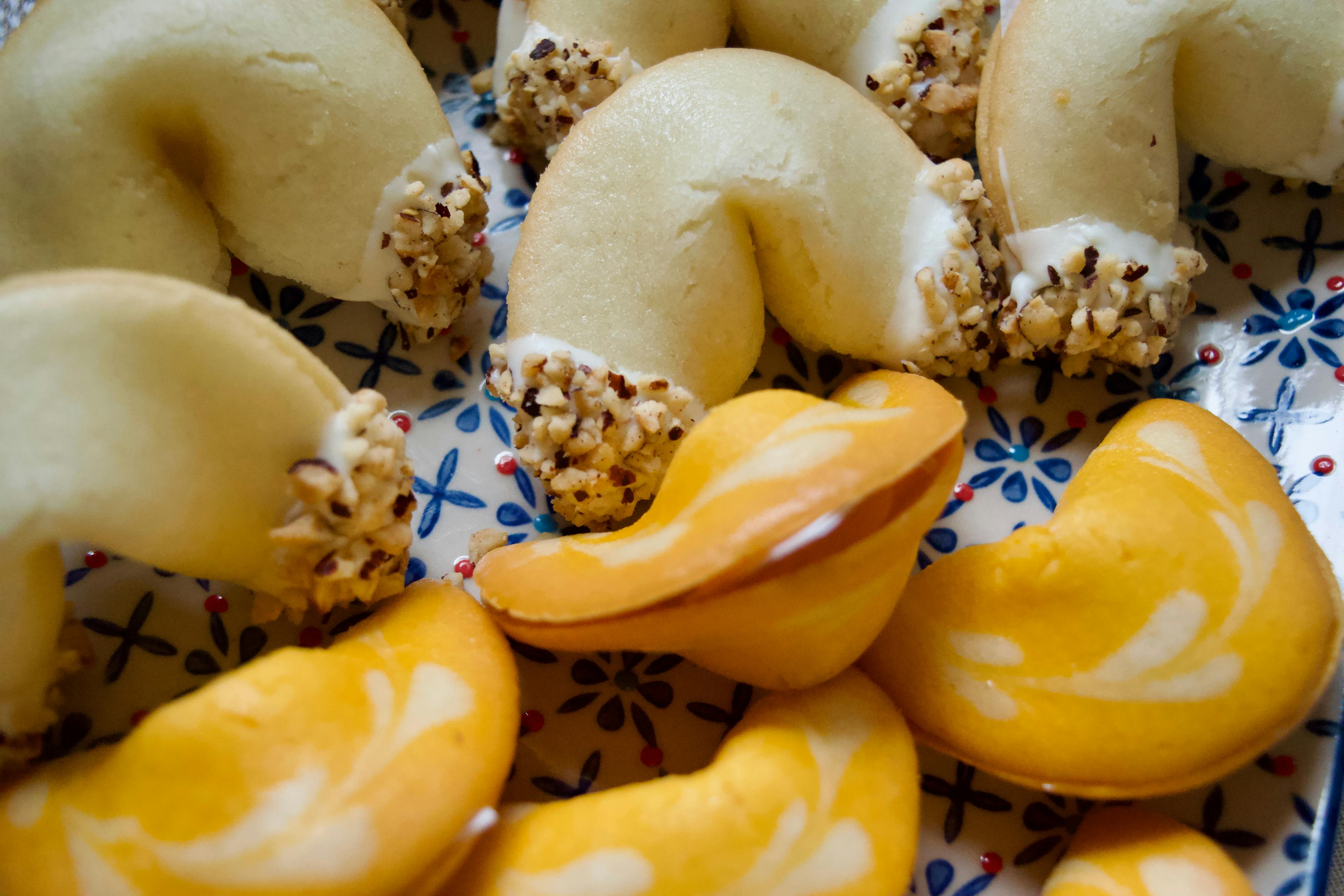 A close up of the fortune cookies on a plate
