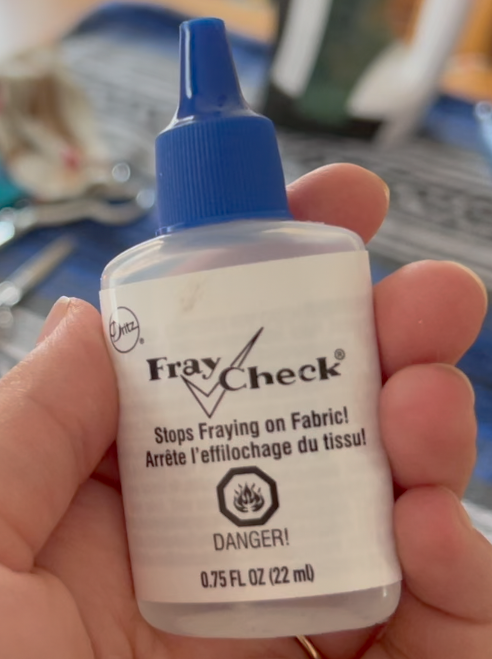 A squeeze bottle of Fray Check