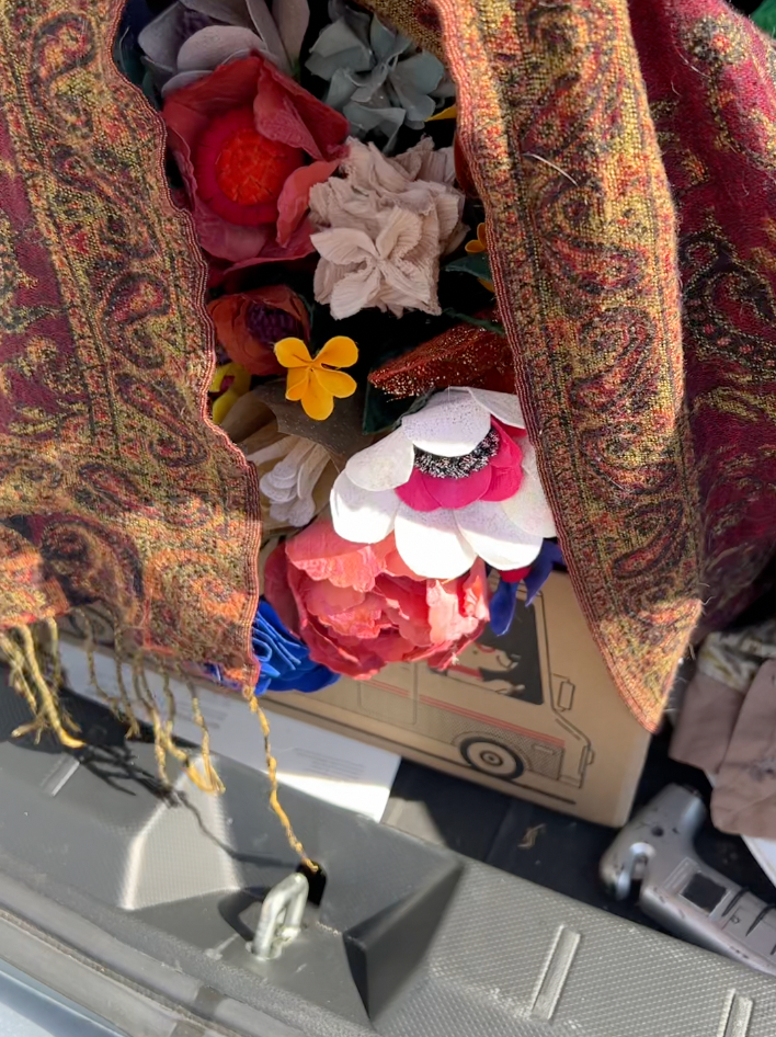 The bouquet in the trunk of our car